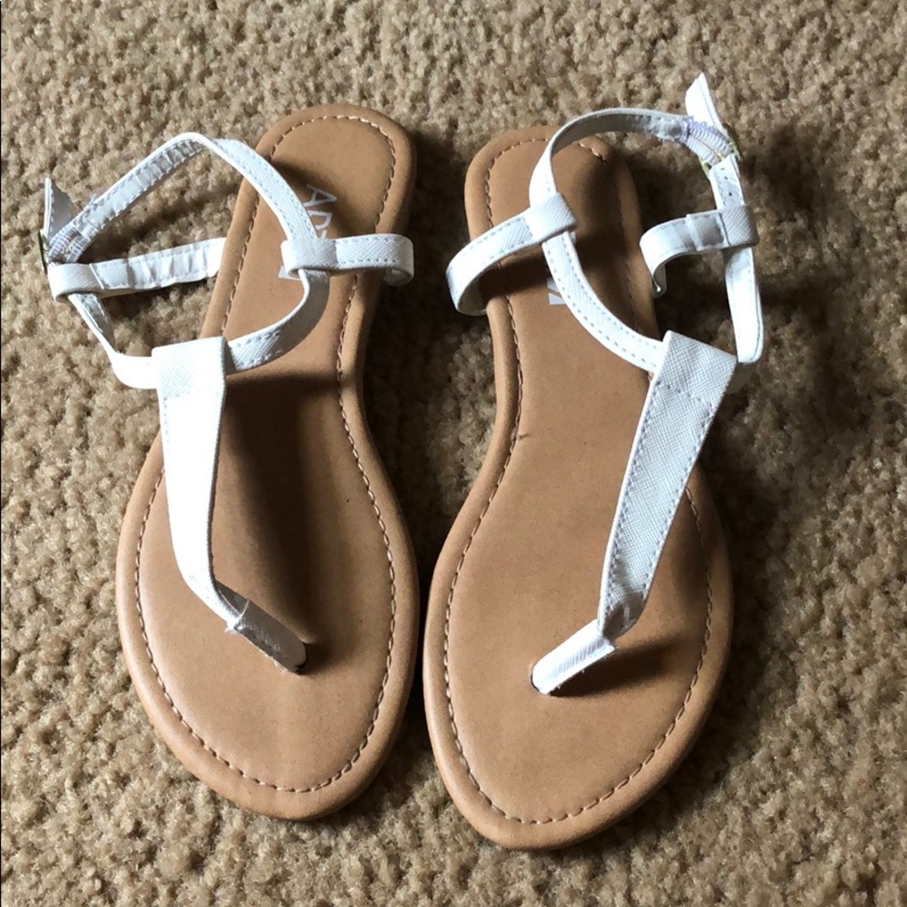 Hardly worn white thong sandals